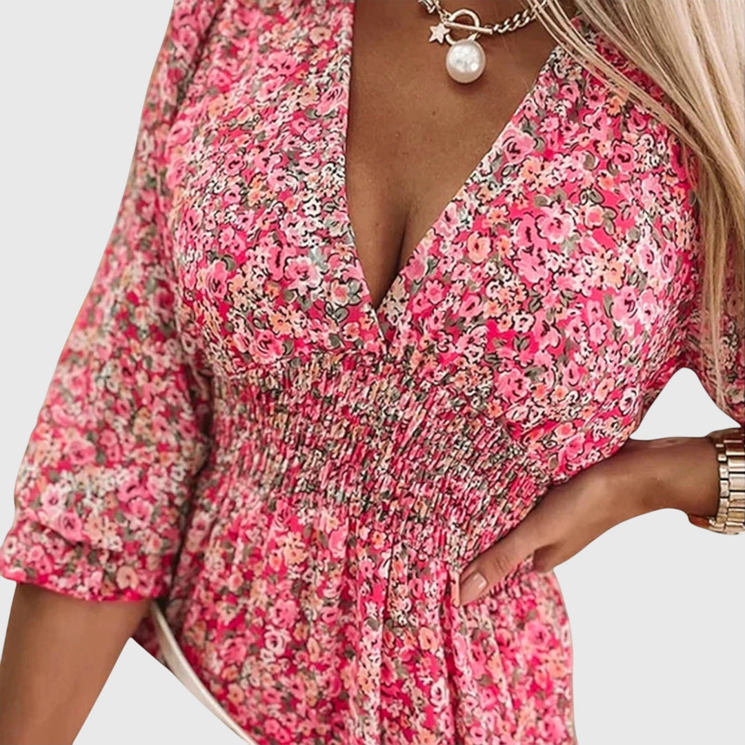 Vestito donna floreale estivo con maniche a sbuffo, scollo a V, stile comodo ed elegante.