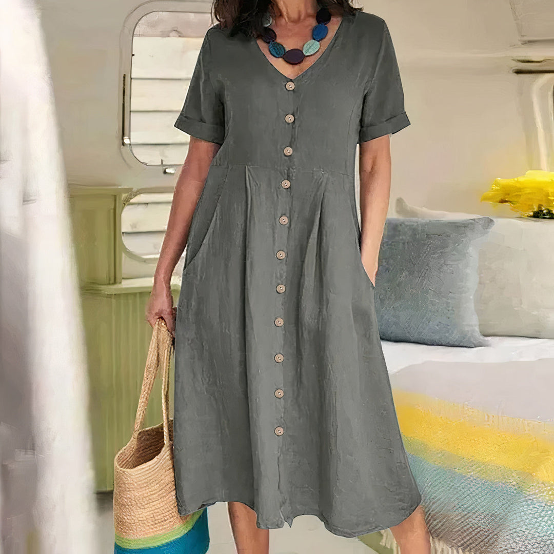 Abito estivo midi blu da donna, leggero e ampio, perfetto per un look casual e confortevole.