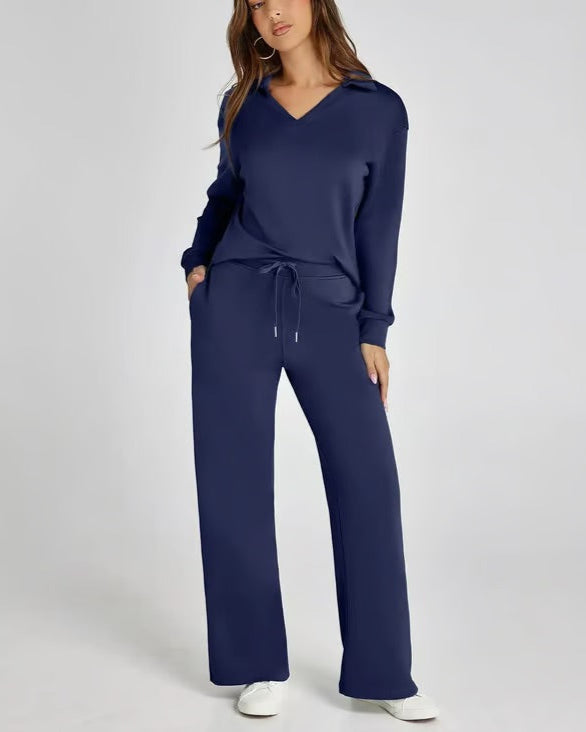Abbigliamento donna relax: set due pezzi con felpa V-neck e pantaloni gamba larga eleganti.