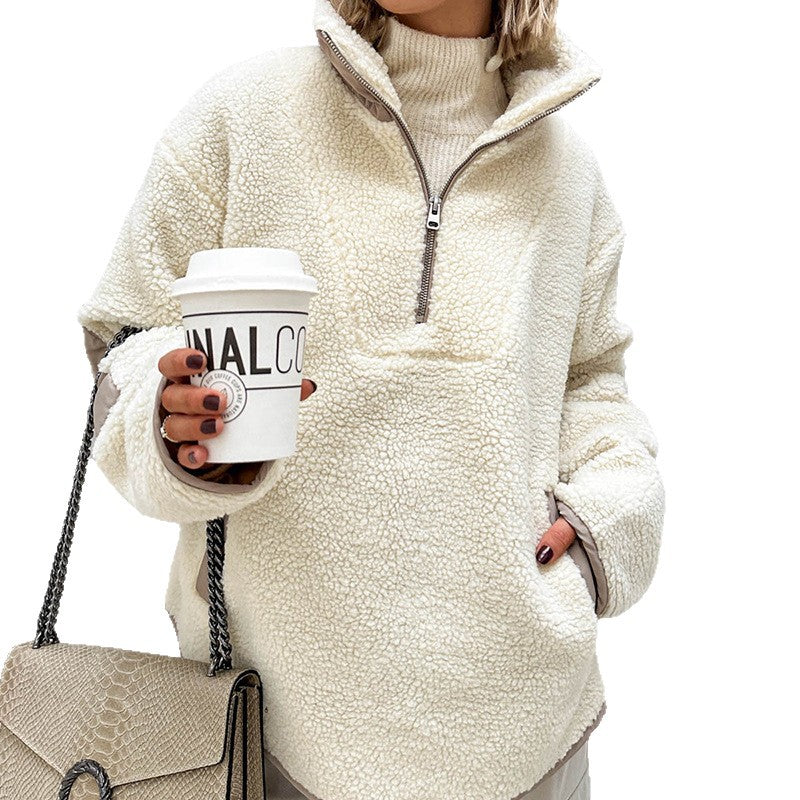Collo risvoltato per maglione donna oversize in pile caldissimo. Stile moderno e comfort elevato per l'inverno.