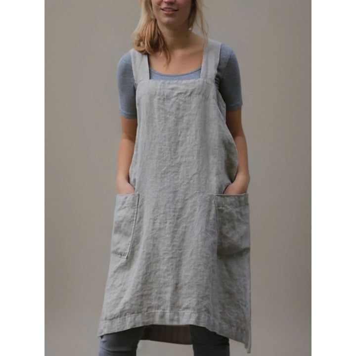 Abito grembiule da donna elegante-casual con tasche. Perfetto per primavera ed estate, comodo e versatile.