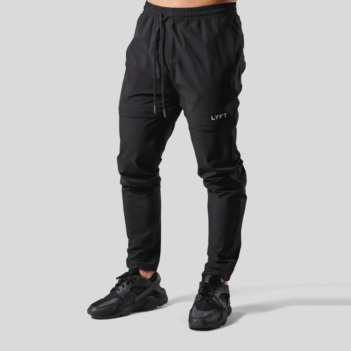 Pantaloni sportivi uomo traspiranti a gamba dritta, assorbono l'umidità per comfort massimo durante allenamento e corsa.