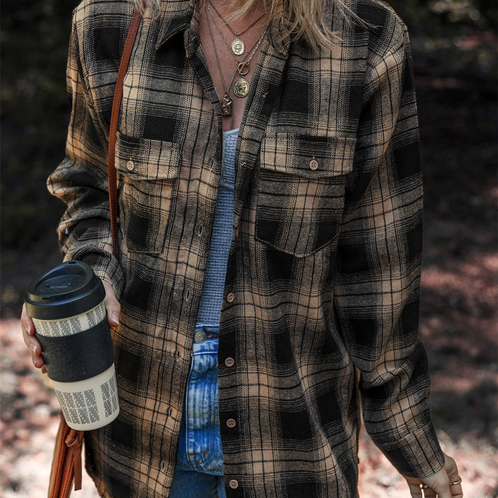 Camicia donna casual a quadri con manica lunga e tasche. Vestibilità ampia per massimo comfort e stile quotidiano alla moda.
