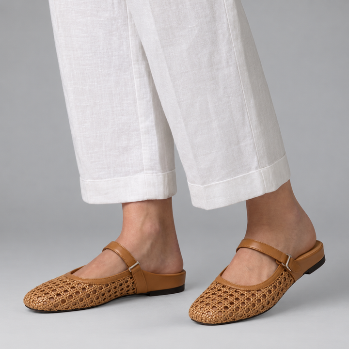 Mules Mary Jane slip-on intrecciate da donna con bottone luminoso. Scarpe eleganti e comode per la primavera.