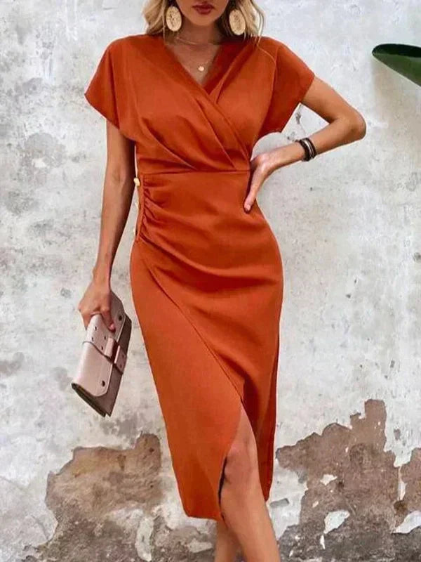Vestito midi arancione elegante con scollo incrociato, ideale per eventi serali e occasioni chic.