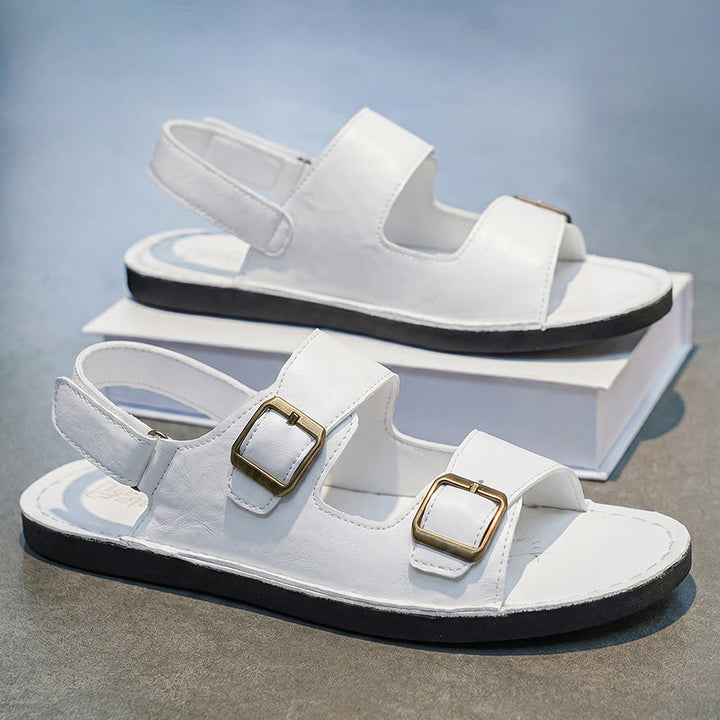 Scarpe uomo: sandali a doppio cinturino con chiusura a strappo, perfetti per comfort e praticità estiva.
