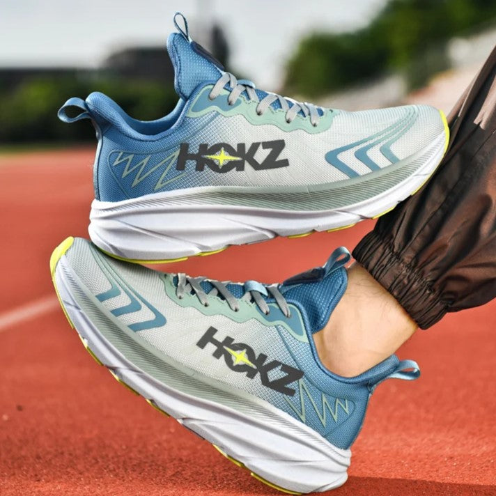 Suola scarpe running donna con trazione per stabilità, ammortizzazione reattiva e supporto.