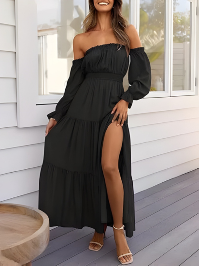 Vestito estivo lungo bohémien con volant, spacco e spalle scoperte, ideale per moda mare e outfit vacanzieri.