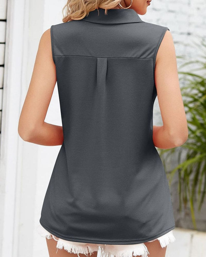 Moda donna: camicetta senza maniche girocollo, blusa elegante per ufficio o tempo libero.