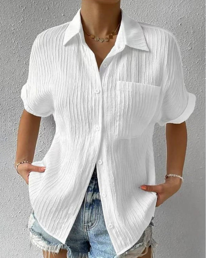 Camicetta donna elegante a manica corta, versatile per ufficio o look chic estivo/primaverile.