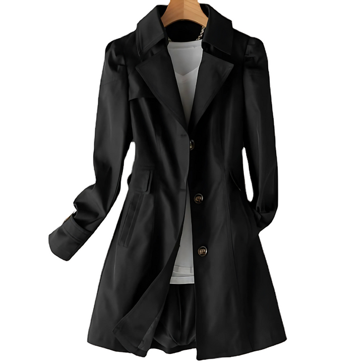 Trench classico donna: modello sagomato, revers ampi, bottoni eleganti. Capo versatile per la mezzastagione.