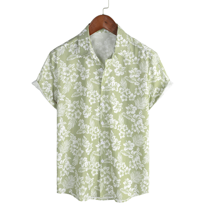 Camicia hawaiana da uomo a maniche corte con dettagli floreali per un tocco tropicale.