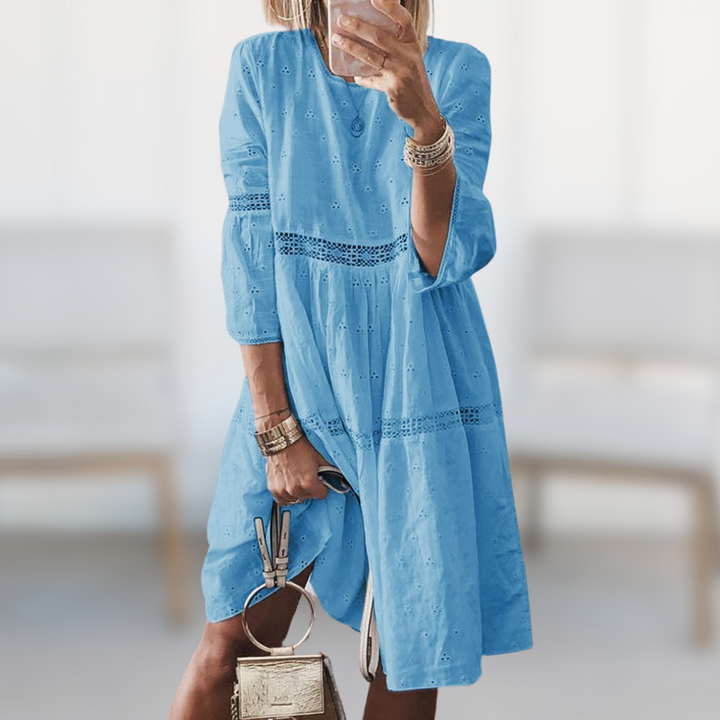 Abito lungo donna in cotone, versatile per look casual, ufficio o eventi. Design fluido ed elegante.