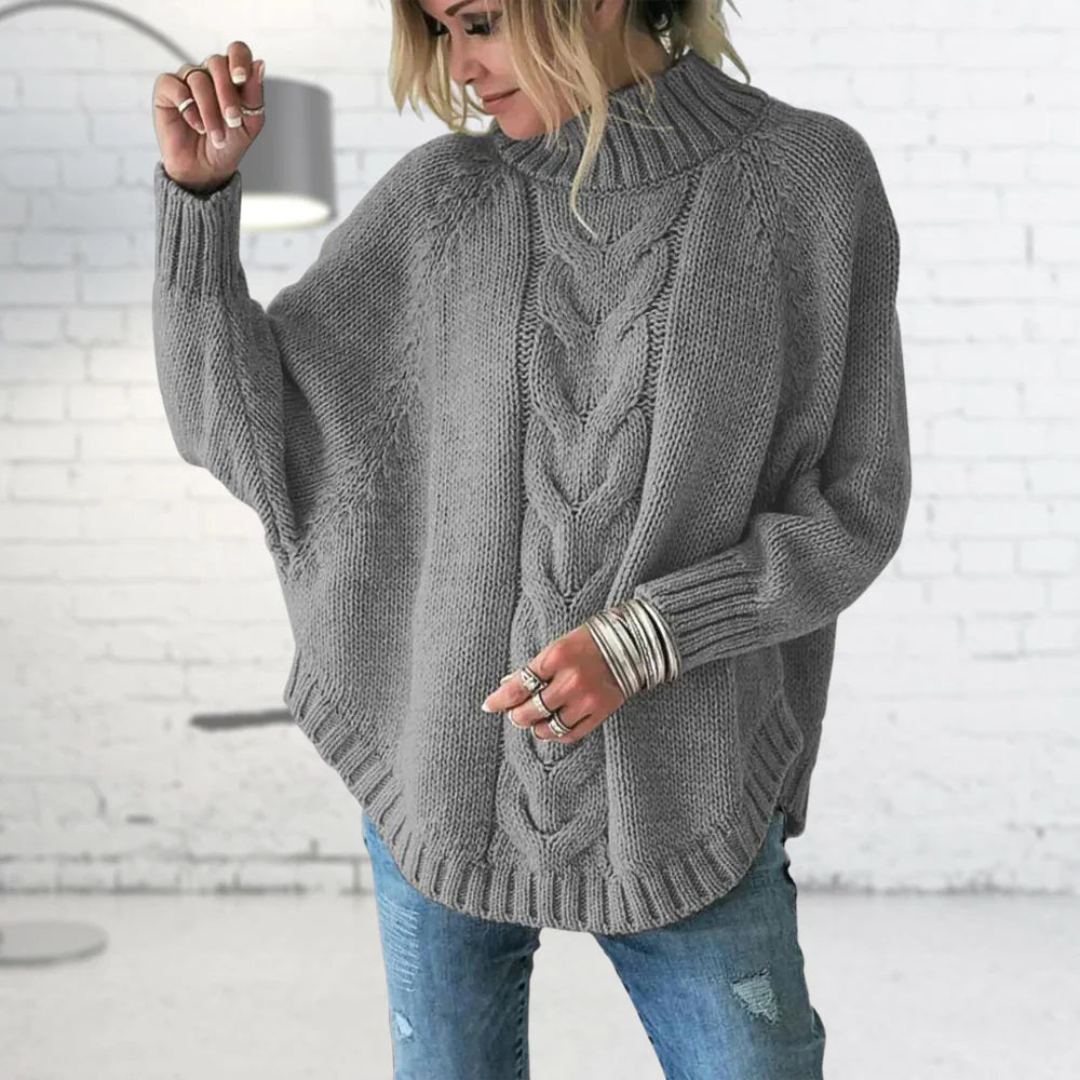 Maglieria donna: maglione dolcevita rosa, modello oversize casual-chic, un capo caldo e di moda per l'inverno.