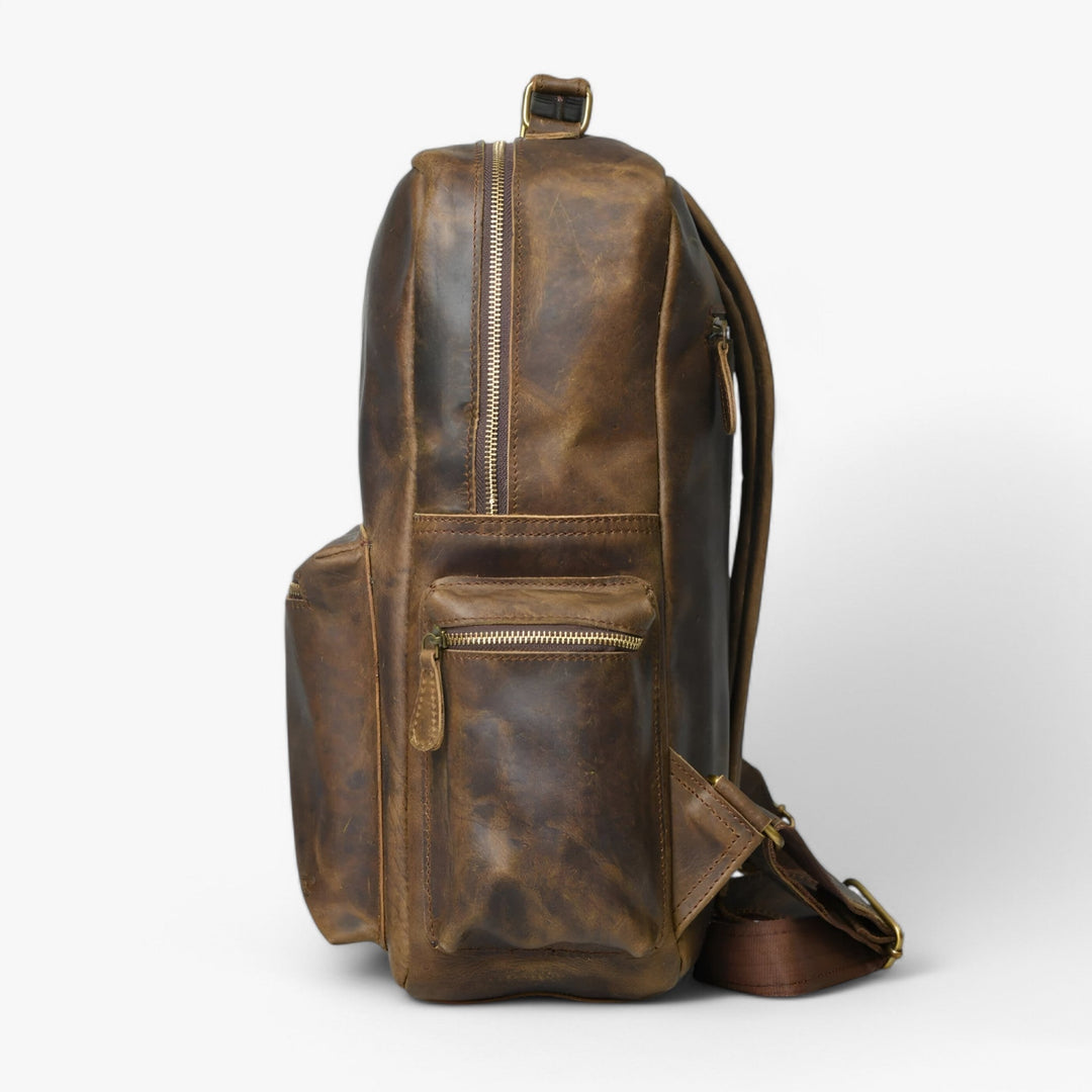 Zaino ergonomico multitasche marrone unisex, ideale per lunghi viaggi o per il trasporto quotidiano.