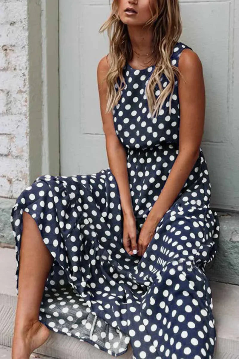 Maxi vestito donna a pois, fluido e leggero. Ideale per l'estate, vacanza mare e un look vintage confortevole.