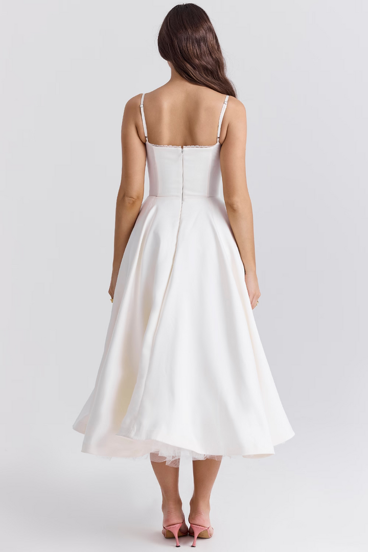 Abito midi donna elegante, taglio fluido per primavera ed estate, molto versatile.