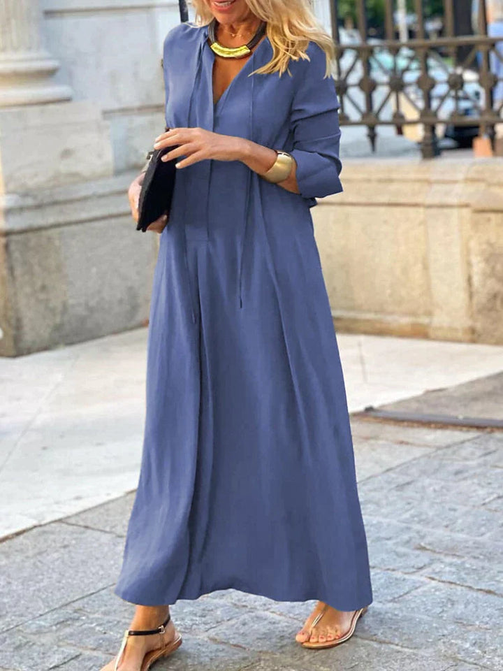 Abito estivo lungo e fluido per donna, offre comfort e stile. Ideale per la moda estiva casual o elegante.