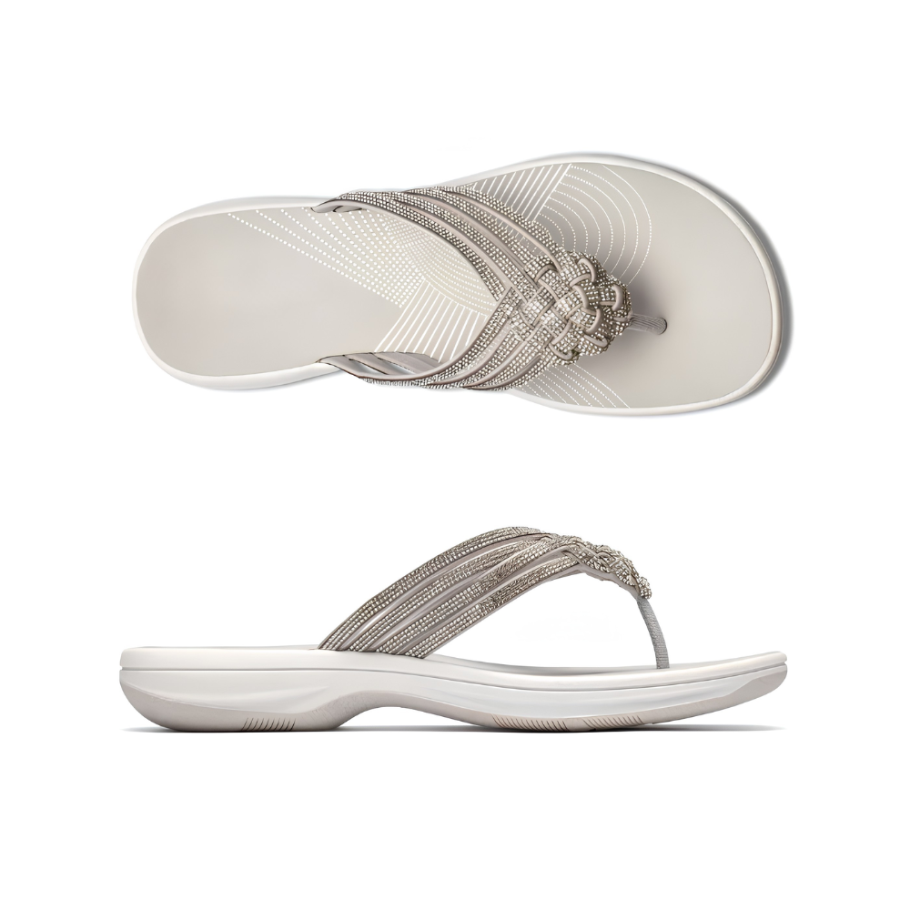 Infradito eleganti da donna con strass argento, perfetti per un look estivo glamour.