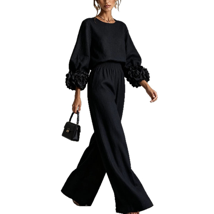 Set coordinato donna, ideale per la moda primavera estate. Completo elegante con top floreale e pantaloni ampi multi colore.