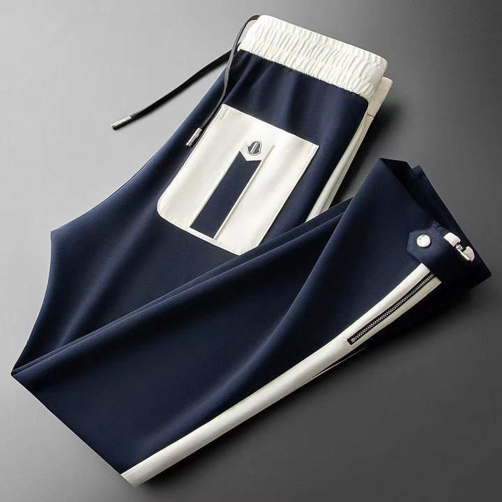 Pantaloni uomo microelasticizzati per comfort, stile patchwork moderno, ideali per look casual e streetwear.