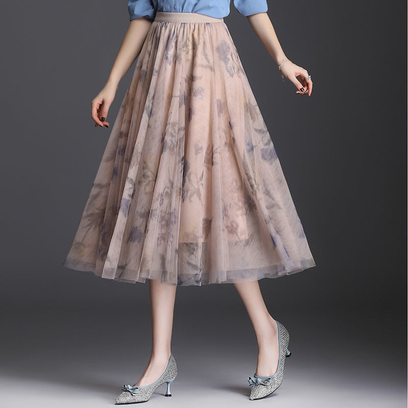Gonna donna midi pieghettata a vita alta, un capo di moda versatile, perfetto per uno stile chic e moderno.