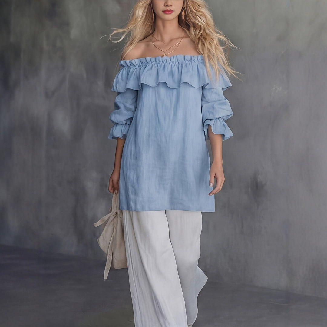 Blusa elegante da donna monospalla con volant e maniche a sbuffo, ideale per serate speciali e occasioni estive.