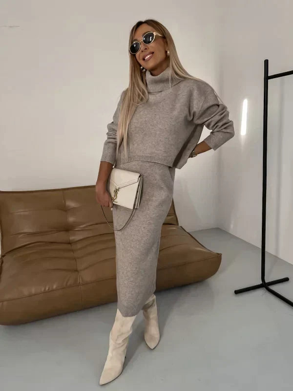 Completo maglieria donna due pezzi: maglione caldo e vestito midi. Perfetto per stile casual chic.