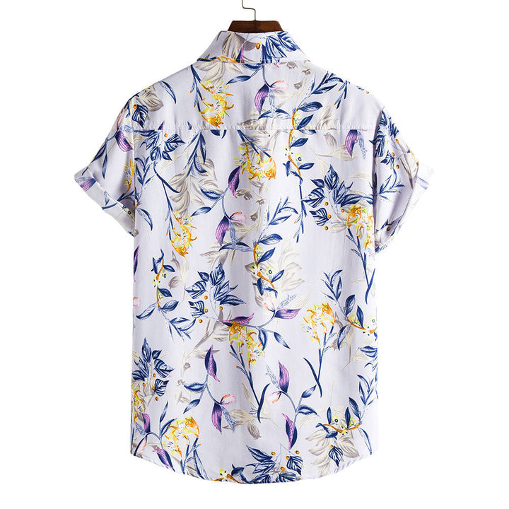 Camicia uomo rossa slim fit estiva, stampa floreale vibrante, colletto a revers. Ideale moda uomo casual.