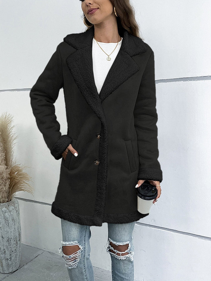 Elegante cappotto invernale lungo da donna con colletto a revers, perfetto per l'ufficio e la moda femminile.