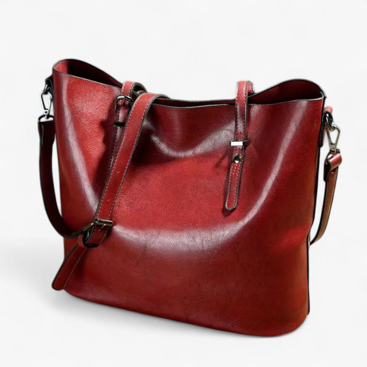Borsa tote donna spaziosa in ecopelle marrone con base rinforzata, design pulito per uso quotidiano.