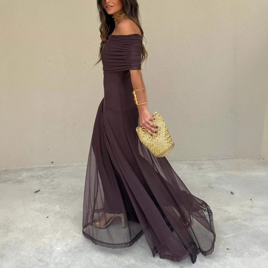Vestito da sera donna chic senza spalline con dettagli in rete e gonna fluida. Perfetto abito da festa.