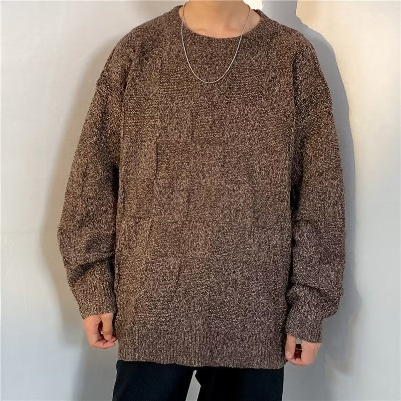 Stiloso maglione invernale da uomo, ampio e caldo, ideale per un look casual e alla moda maschile.