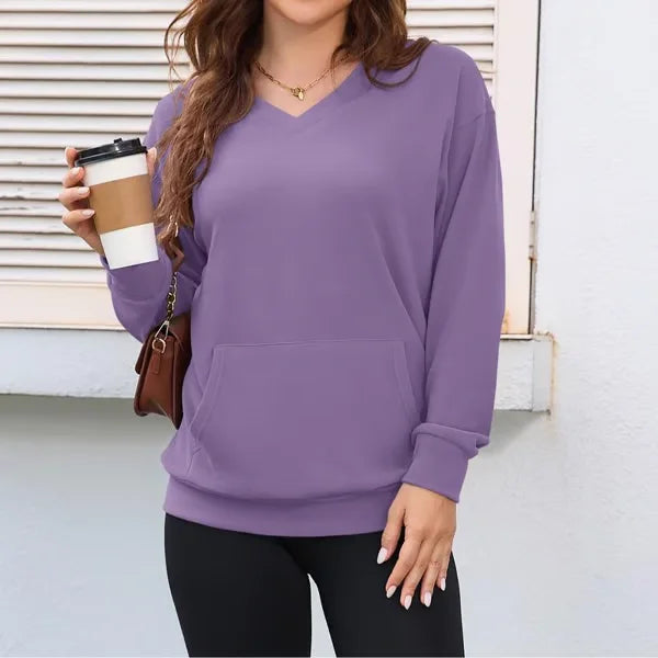 Maglione donna per autunno inverno, modello pullover casual con tasca frontale, comfort e stile femminile.