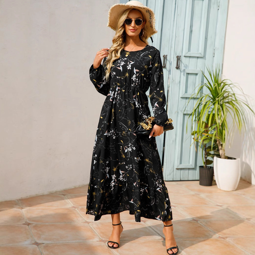 Abito lungo versatile da donna con stampa floreale e scollo rotondo, adatto a festa e casual.