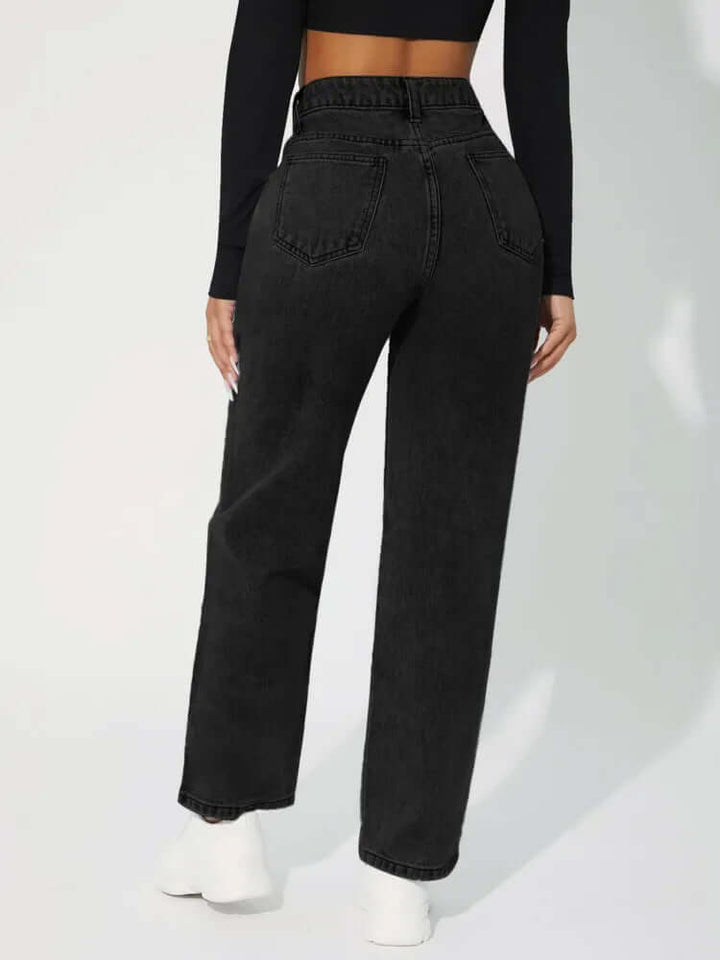 Eleganti jeans donna vita alta gamba dritta con chiusura a zip, perfetti per outfit versatili e di tendenza.