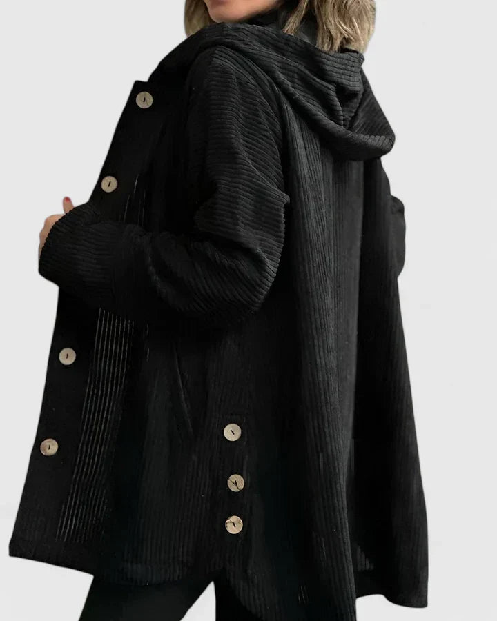 Giacca donna con cappuccio e texture in velluto a coste, abbigliamento casual e confortevole.