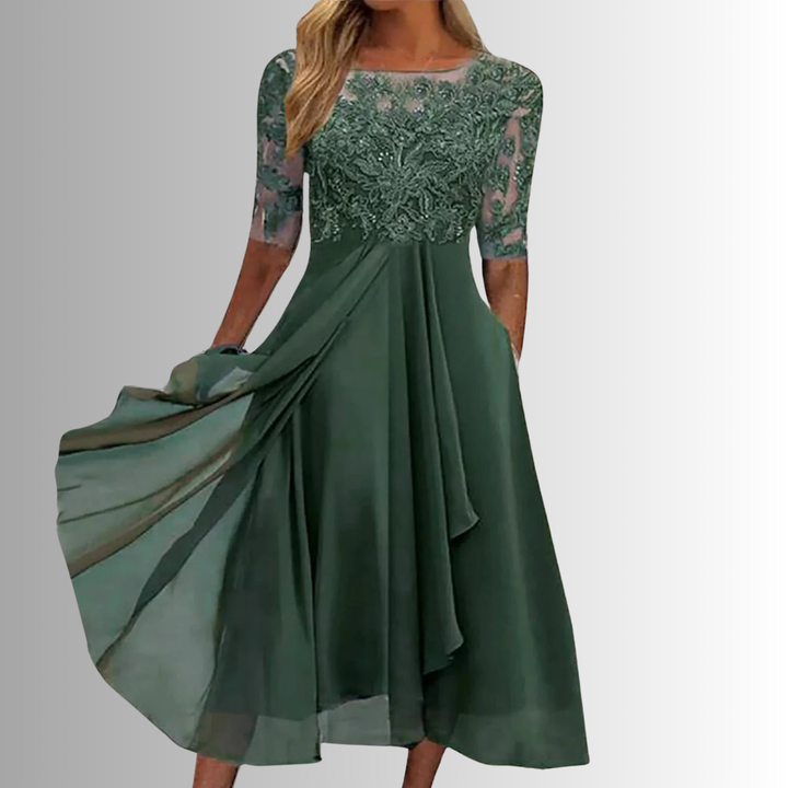 Abito midi donna alla moda italiana, con dettagli in pizzo e linea elegante. Abbigliamento femminile chic.