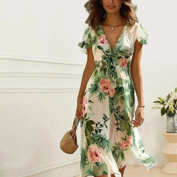 Vestito midi estivo donna floreale verde, ideale per vacanze e look casual chic di primavera.