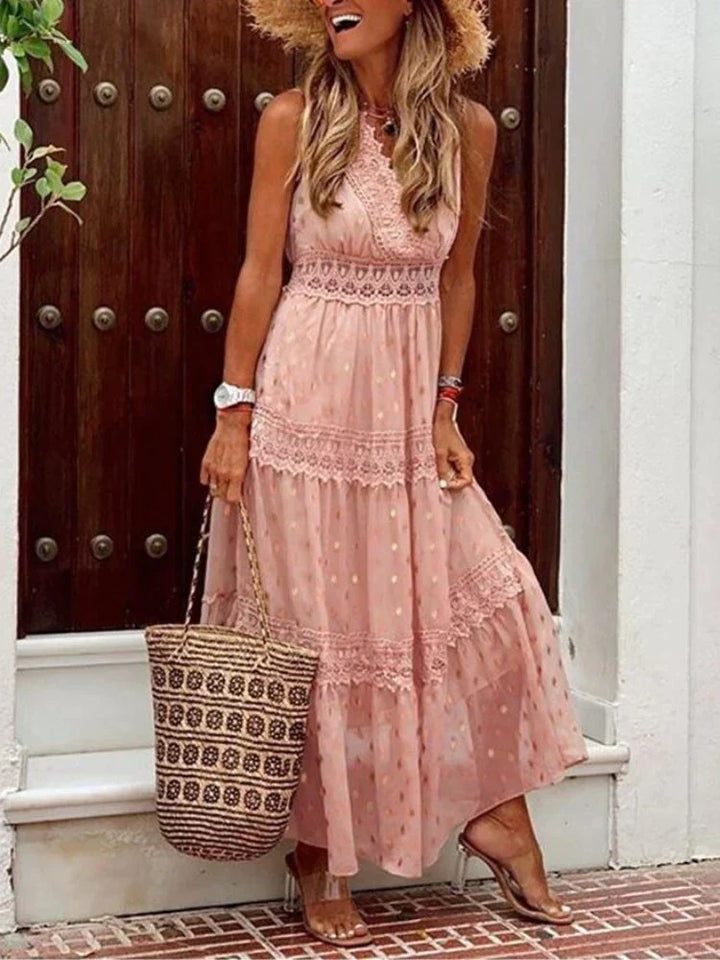 Elegante abito lungo da donna in pizzo, perfetto per feste estive e occasioni speciali.