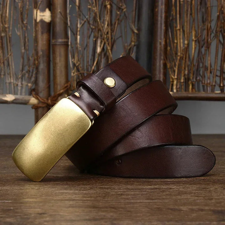 Accessorio uomo: cintura in pelle pieno fiore con fibbia in ottone. Versatile, resistente e di tendenza.