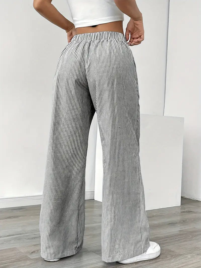 Righe moda: pantaloni larghi donna, eleganti e pratici, con tasche laterali.
