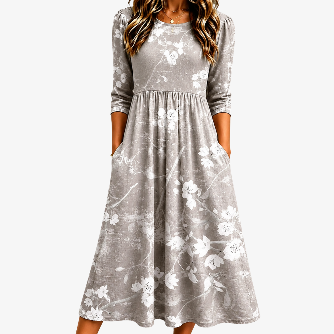 Abito midi donna elegante e fluido con tasche, ideale per look casual o quotidiani, perfetto per ogni silhouette.