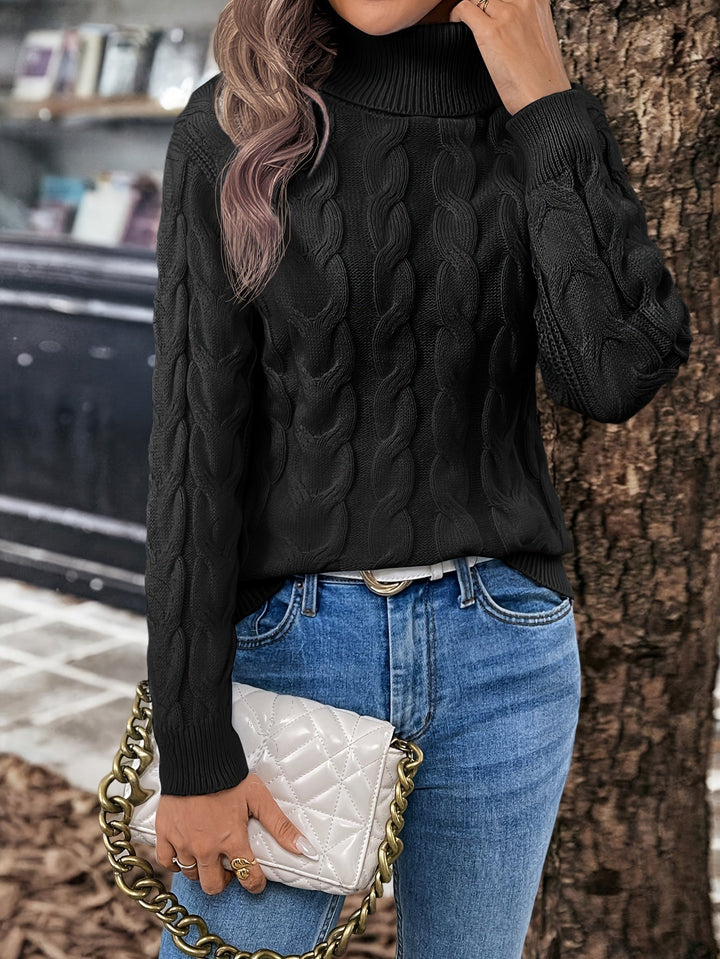 Pullover donna a trecce comodo, collo alto avvolgente. Protezione e stile contro il freddo.
