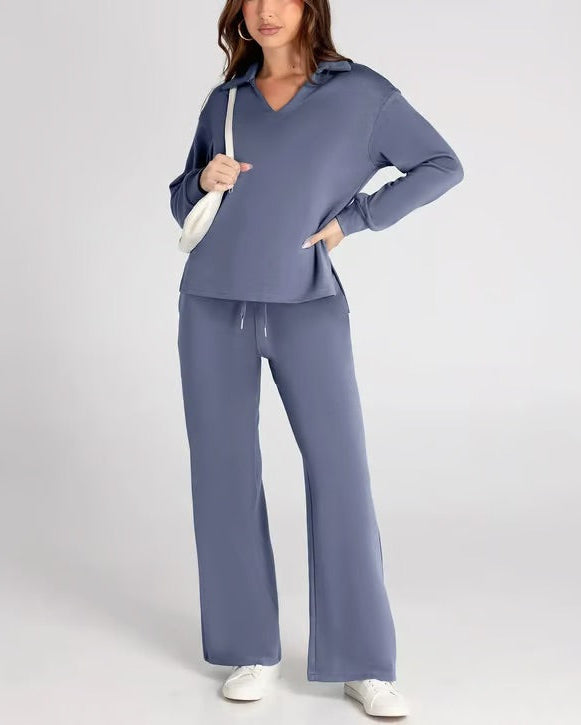 Completo donna autunno-inverno: felpa scollo a V e pantaloni a gamba larga per comfort ideale.