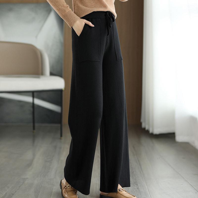 Eleganti pantaloni donna a vita alta con gamba larga, ideali per outfit raffinati e alla moda in ogni stagione.