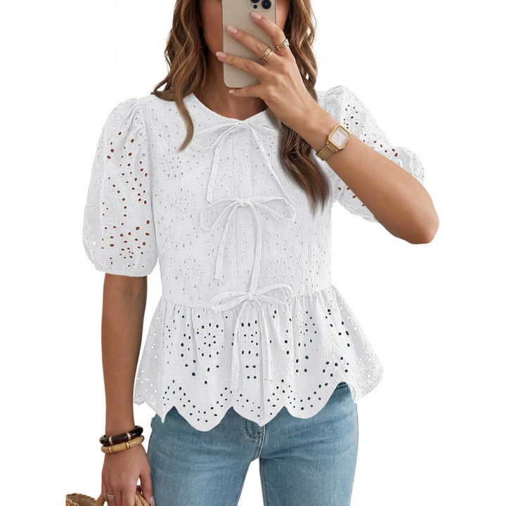 Blusa elegante da donna con volant, maniche a sbuffo e cintura. Ottima per abbigliamento serale o casual.