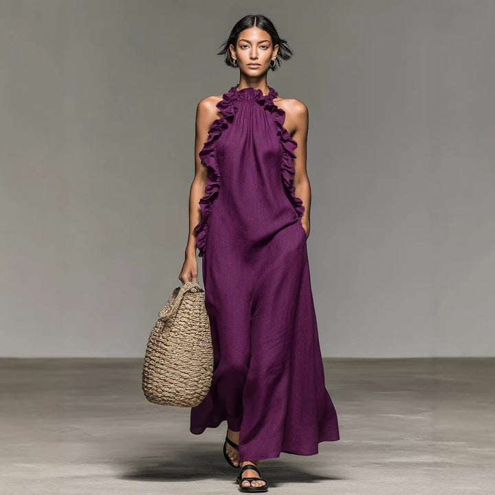 Abito lungo donna senza maniche, scollo all'americana. Vestito fluido con balza per look estivo elegante e raffinato.