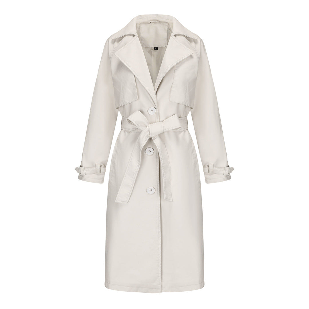 Moda donna: trench lungo elegante con cintura, revers ampi, perfetto per look sofisticati.