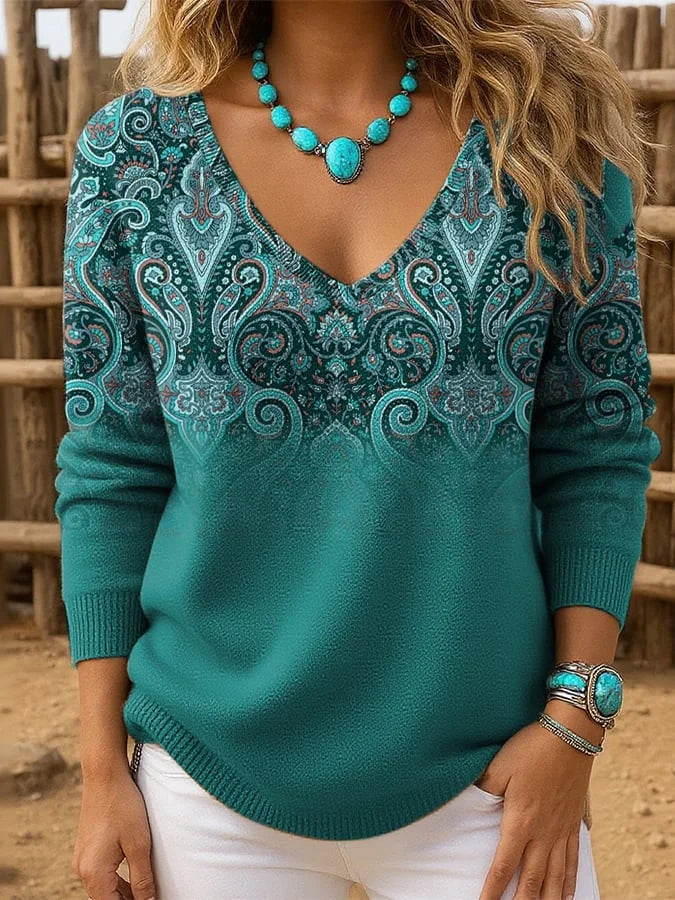 Maglia stampata donna con scollo a V, maniche lunghe. Abbigliamento femminile comodo per stile quotidiano.